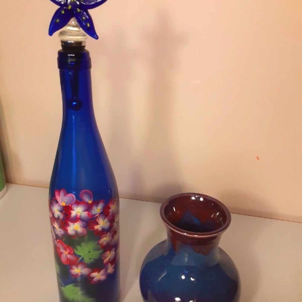 Cobalt blue handpainted decorative bottle with stopper and pottery vase